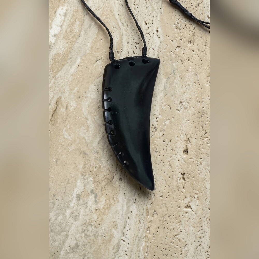 Rei Niho, tooth pendant · kawakawa pounamu, handcrafted pounamu